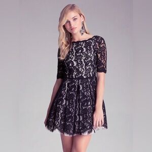 Bebe lace knee length dress black size 2
